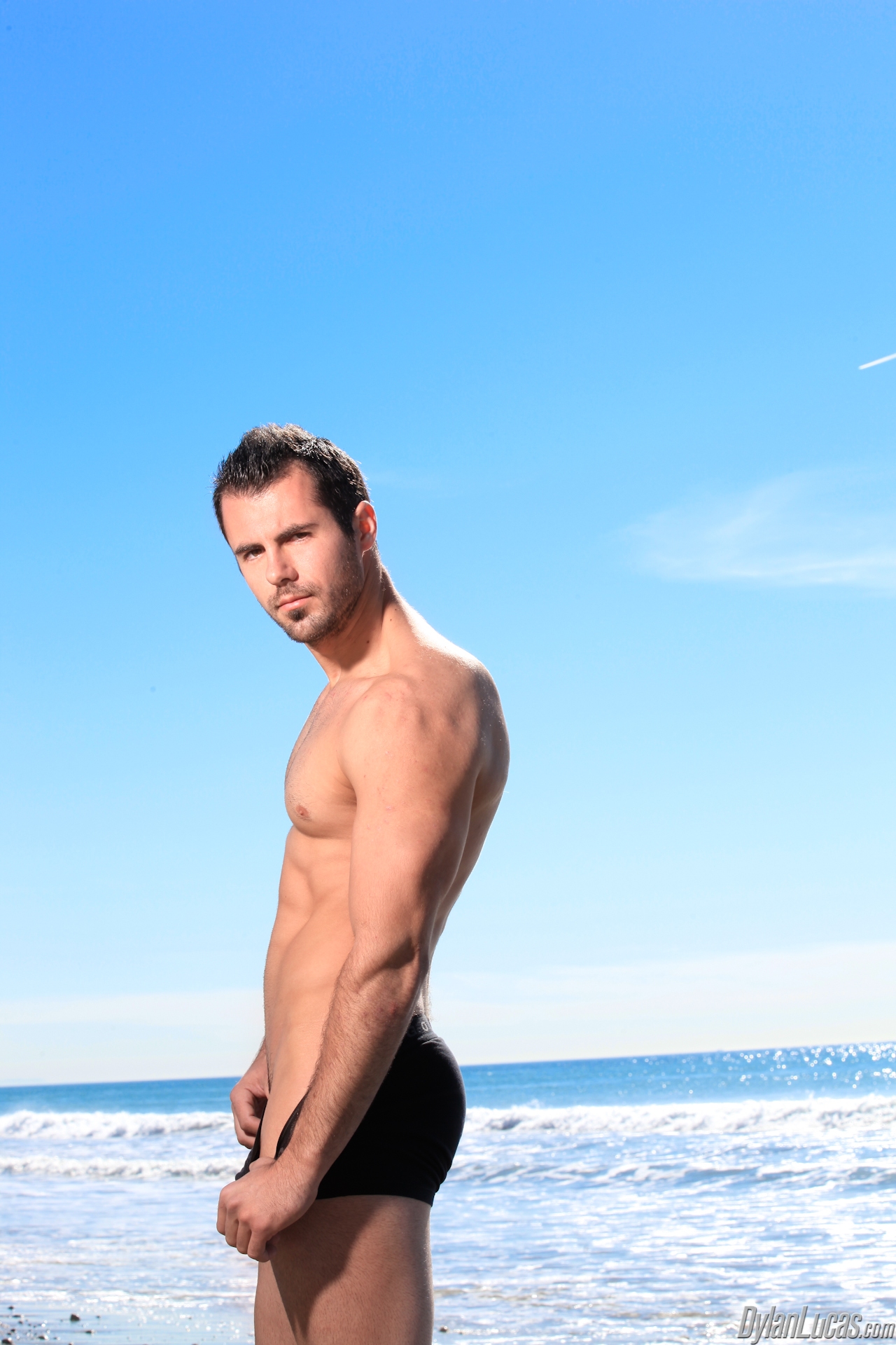 Brock Cooper posing naked by the sea by Dylan Lucas